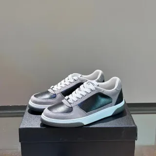 Chanel Low-Top Suede and Perforated Leather Sneaker