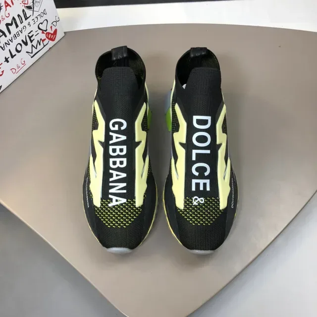 Dolce & Gabbana Zapatillas Lifestyle negras y amarillas con parte superior de tejido ajustable sock-fit y gráfico bold lightning-bolt 9