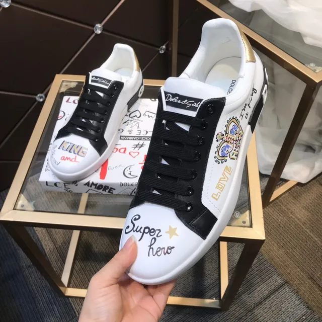 Dolce & Gabbana Portofino حذاء رياضي أبيض أسود مطبوع جرافيتي من الجلد والمطاط 3