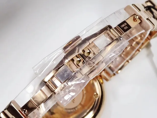 Emporio Armani Star Motif गुलाबी सोने का टोन क्वार्ट्ज घड़ी 4