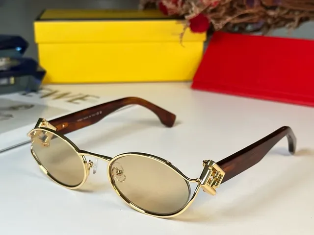 Fendi Oval Gold Frame Navy Acetate Temple Sunglasses 9
