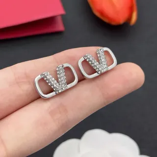Brincos com perno com cristais em forma de V