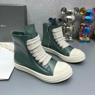 Botas de cremallera de alto con verde oscuro y crema