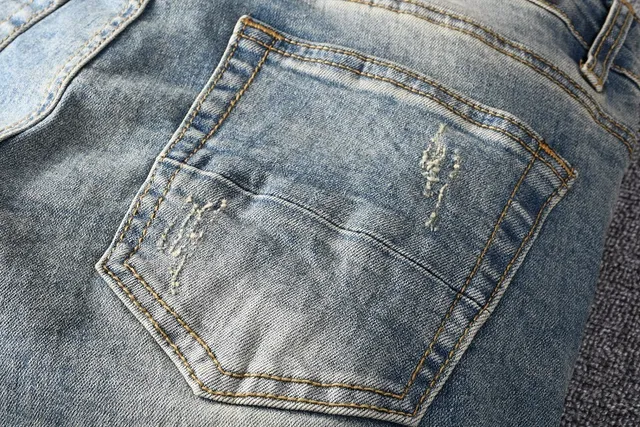 Distressed Patchwork Light-Wash Slim-Fit Jeans 13