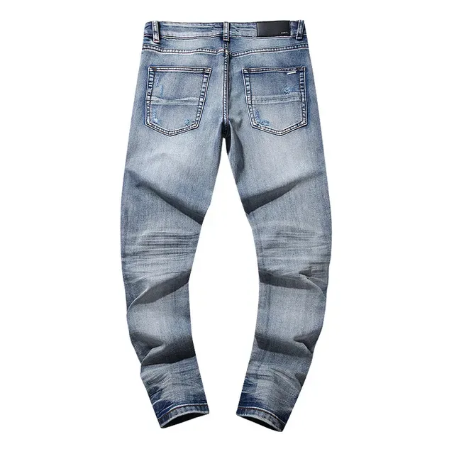 بناطيل جينز أزرق ممزقة مفتوحة الفتق مع قصة slim-tapered 3