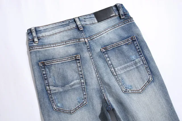 بناطيل جينز أزرق ممزقة مفتوحة الفتق مع قصة slim-tapered 6