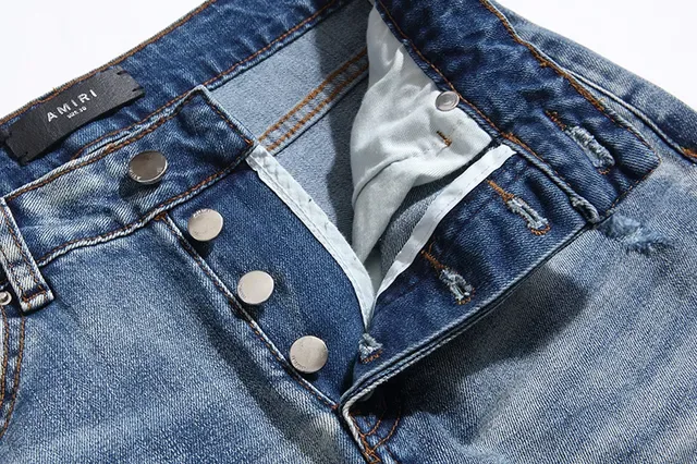 بناطيل جينز أزرق ممزقة مفتوحة الفتق مع قصة slim-tapered 8
