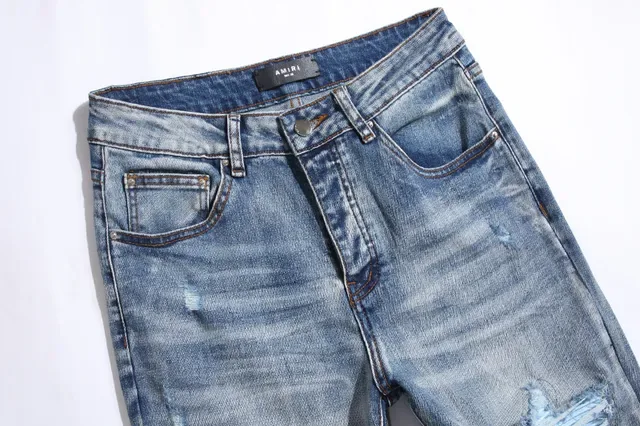 بناطيل جينز أزرق ممزقة مفتوحة الفتق مع قصة slim-tapered 11