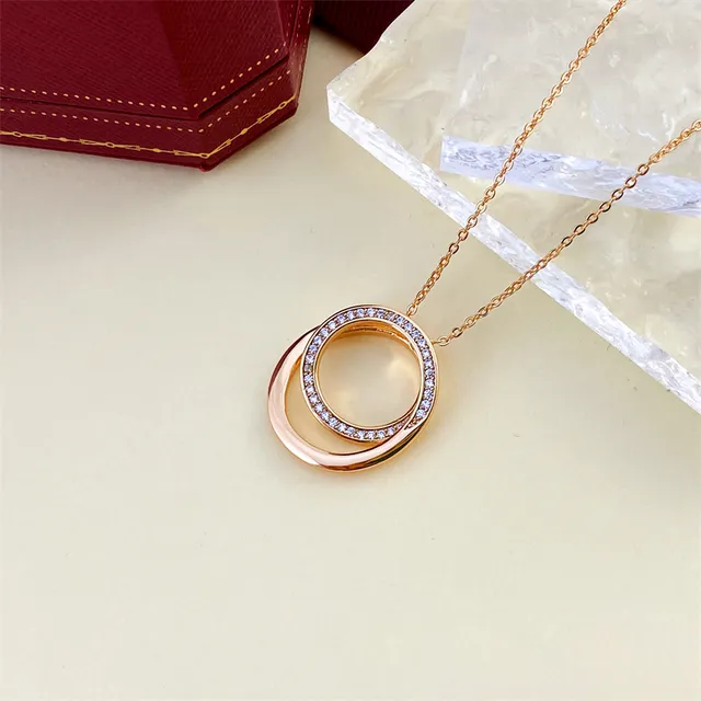 Gold and Silver Double Interlocking Ring Pavé Pendant Necklaces 2