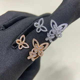 Aretes de cristales Pavé-Set con silueta de mariposa en oro y plata