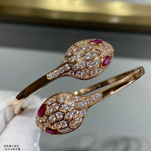 Pulsera con motivo de cabeza de serpiente en oro y plata con cristales pavé 7