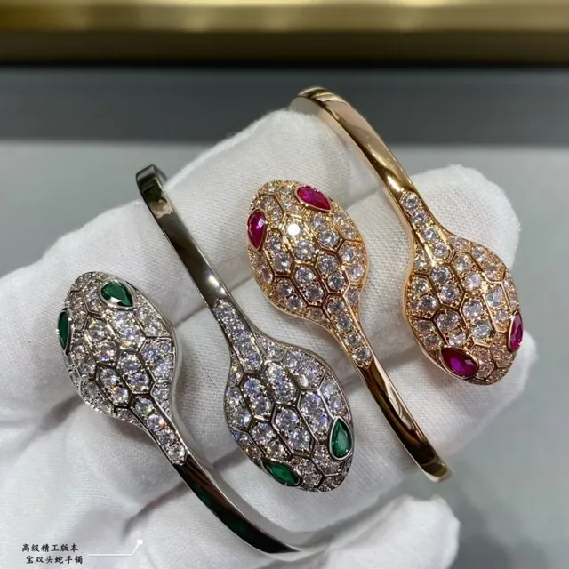 Pulsera con motivo de cabeza de serpiente en oro y plata con cristales pavé 9