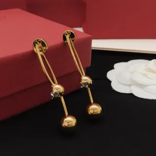 Brincos dourados pendentes com contas esféricas