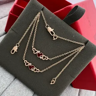 Colliers pendentifs cœur émaillé et cristal en ton doré