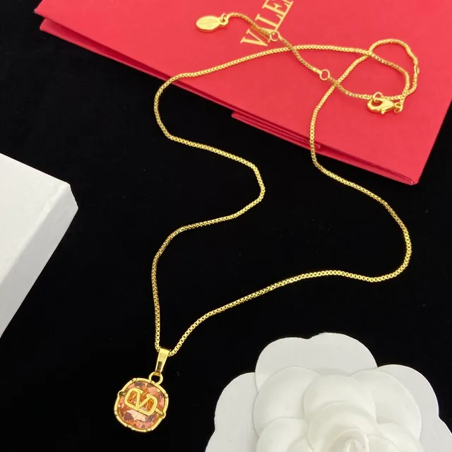 Gold-Tone Monogram Crystal Pendant Necklaces 4