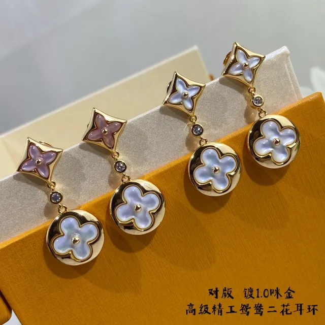 Aretes colgantes de flor de cuatro pétalos de madreperla tono dorado 5