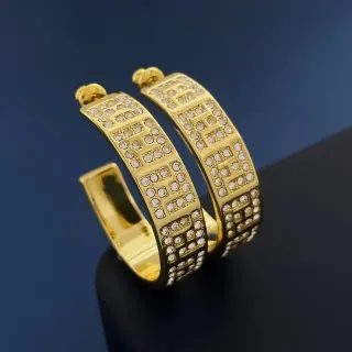 أقراط حلقية بلون ذهبي مع كريستال Pavé هندسي لاتيس