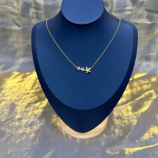 Collier avec pendentif étoile de mer en ton doré pavé