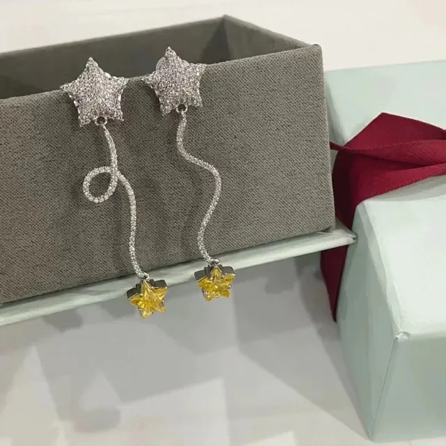 HEFANG Pendientes plata estrella amarilla pavé-set 8
