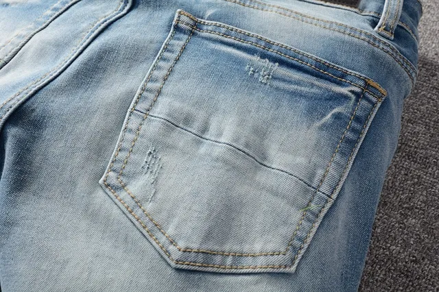 Light-Wash Distressed Slim-Fit Embroidered Patch Jeans 5