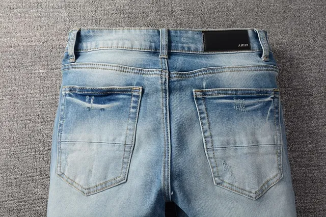 Light-Wash Distressed Slim-Fit Embroidered Patch Jeans 6