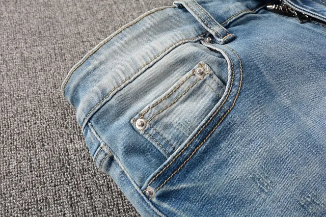 Light-Wash Distressed Slim-Fit Embroidered Patch Jeans 9
