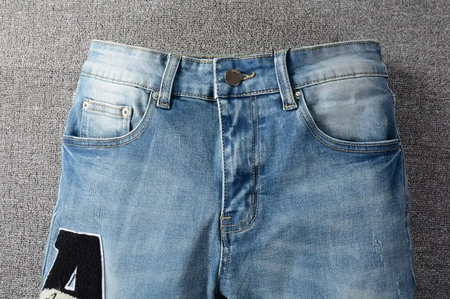 Light-Wash Distressed Slim-Fit Embroidered Patch Jeans 14