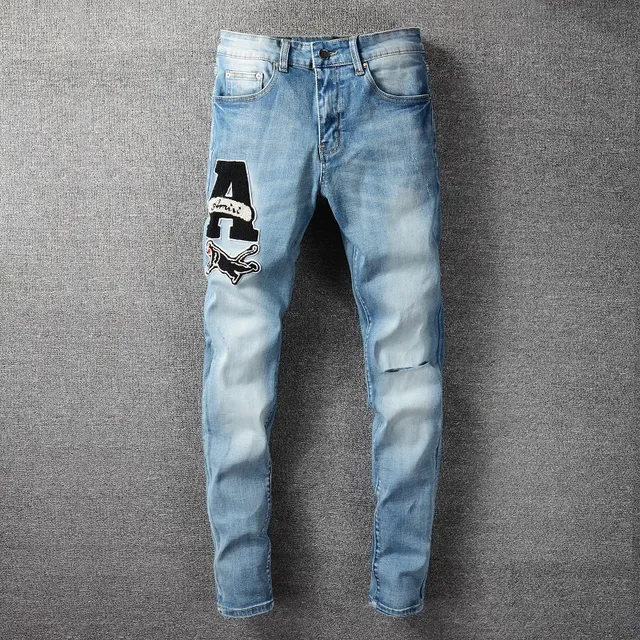 Light-Wash Distressed Slim-Fit Embroidered Patch Jeans 16