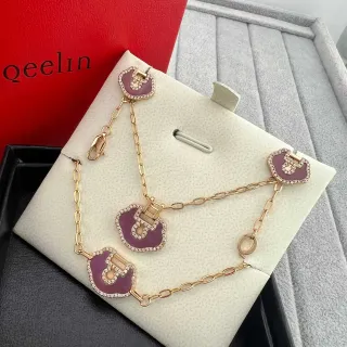 سوار Qeilin Bo Bo بلون أرجواني مطلي بالإيملي مع قفل تشارم مزين ببافيه