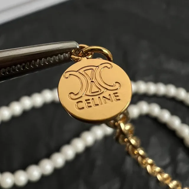 Collier à pendentif perle en or blanc 2