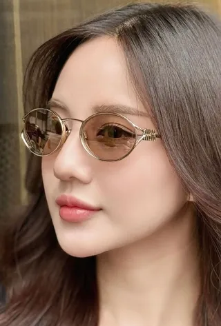 Gentle Monster Lentes ovaladas douradas pretas moldura de metal fina óculos de sol 5