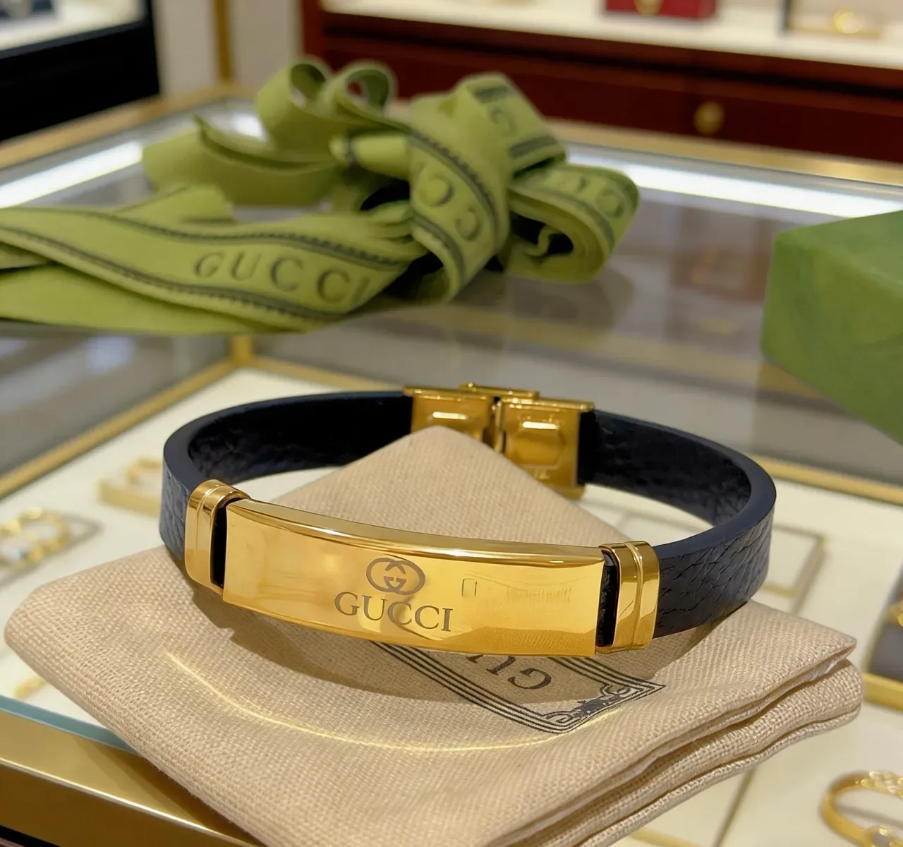 Gucci Black Leather and Gold-Tone Plaque Bracelet 9