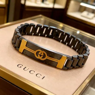 Gucci G-Link سوار معدني أسود وذهبي