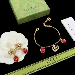 Gucci GG Marmont سلسلة ذهبية حمراء متشابكة G تعاويذ سوار