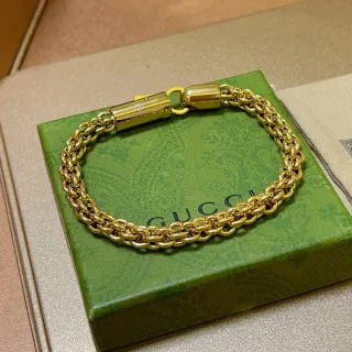 Gucci سوار سلسلة كرب لينك مضفورة ذهبية مغلق أسطواني مغناطيسي