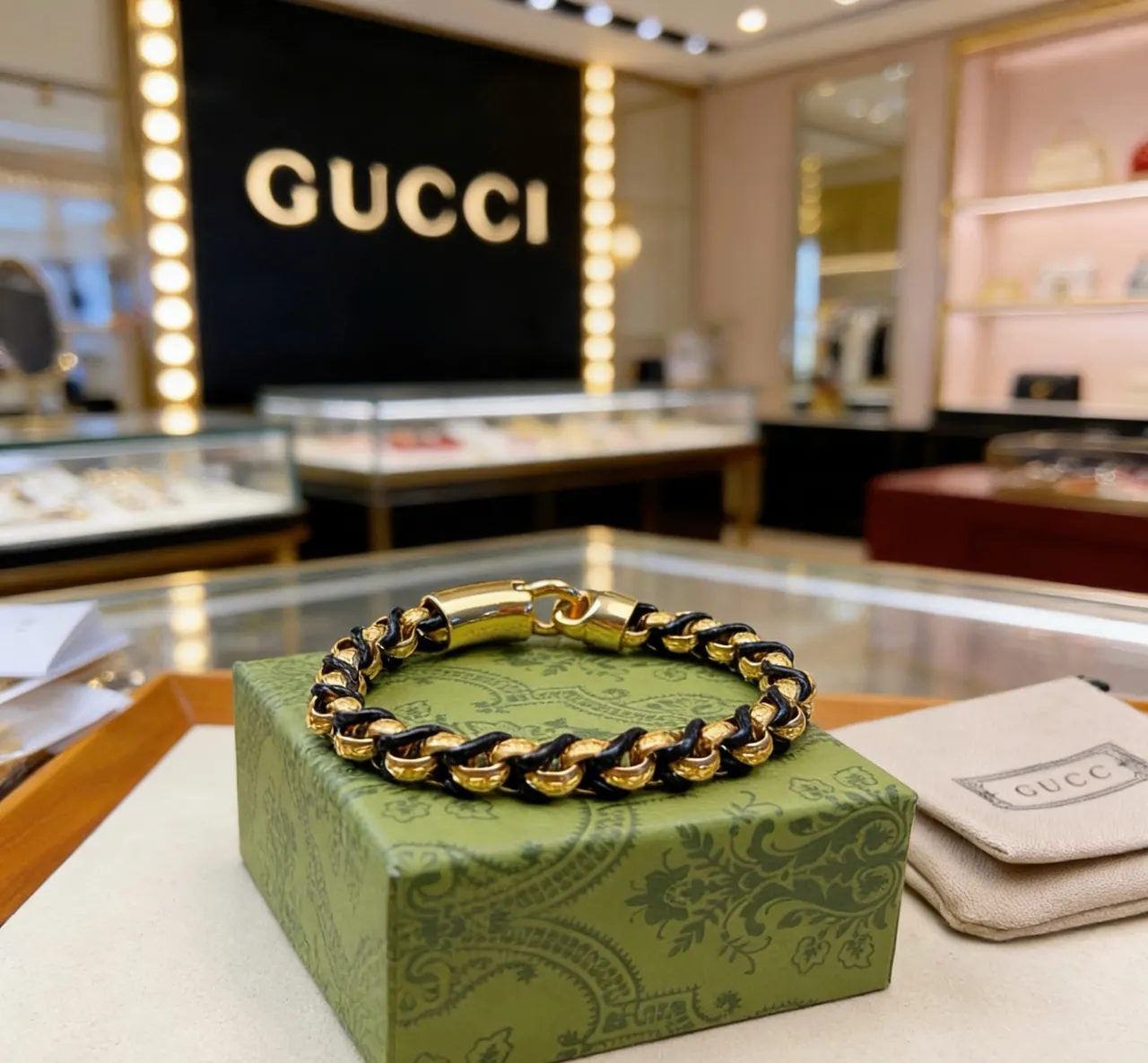 Gucci Interwoven Gold and Black Leather Chain Bracelet 6