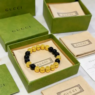 Gucci سوار نقش وردة خرز أسود وذهبي مصقول