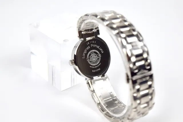 Longines 银白色圆形表壳集成金属表带机械表 6