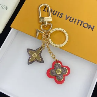 Louis Vuitton फूल की होल्डर लाल भूरा गोल्ड-टोन हार्डवेयर मोनोग्राम-कोटेड लेदर हैंडबैग