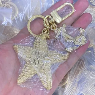 Louis Vuitton Gold Metal Textured Starfish Charm Jewelry