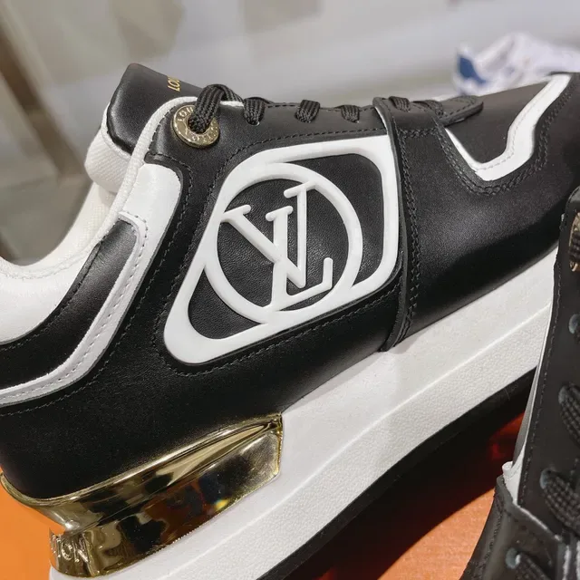 Louis Vuitton LV Trainer Black White Monogrammed Side Panel Gold Heel Accent Lifestyle Sneakers 7