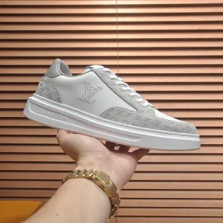 Louis Vuitton LV Trainer blanco gris perforado logotipo monograma monogramado ante paneles zapatillas lifestyle