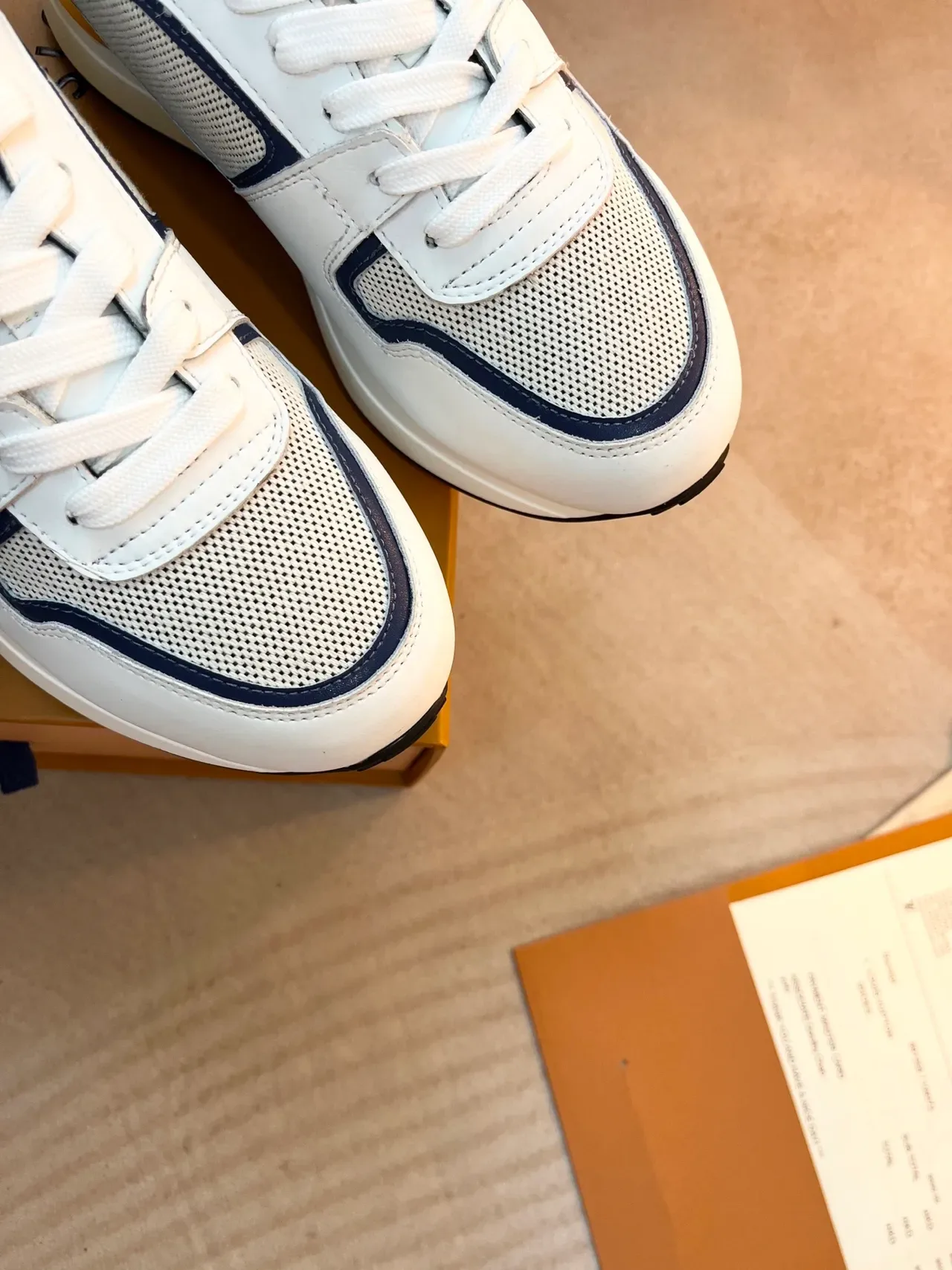 Louis Vuitton LV Trainer White Navy Monogrammed Side Panel Mesh And Leather Hybrid Upper Lifestyle Sneakers 3
