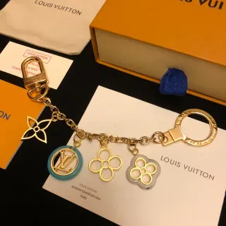 Louis Vuitton Monogram ورد ذهب أزرق معدني سوار متعدد التعويذات