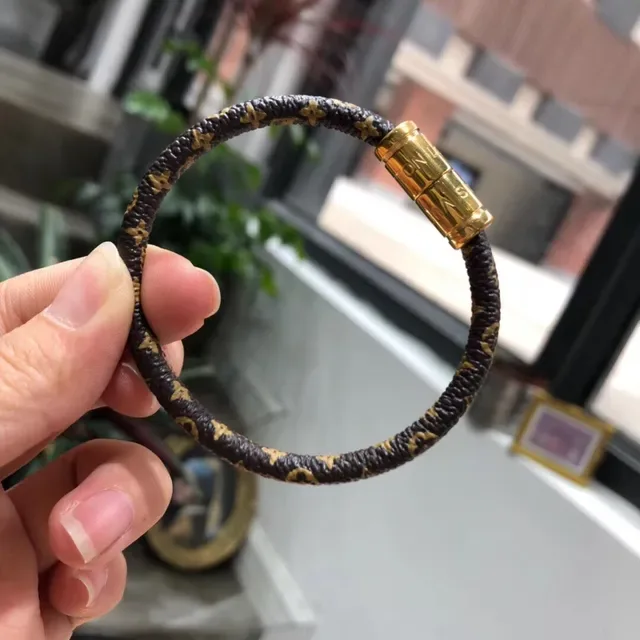 Louis Vuitton Monogram Bracelet Cuir Noir Doré Tressé Cilindrique Fermeture Magnétique 2