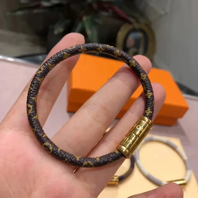Louis Vuitton Monogram Bracelet Cuir Noir Doré Tressé Cilindrique Fermeture Magnétique 6