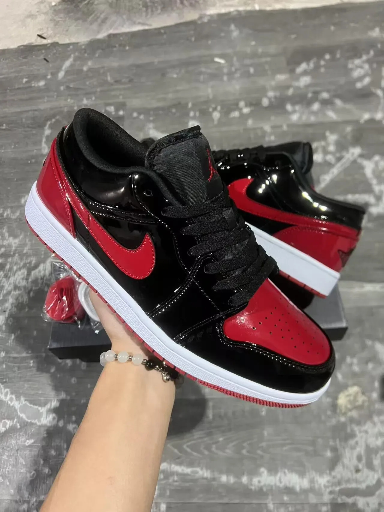 Nike Air Jordan 1 Low Preto Vermelho Brilhante tênis lifestyle 2