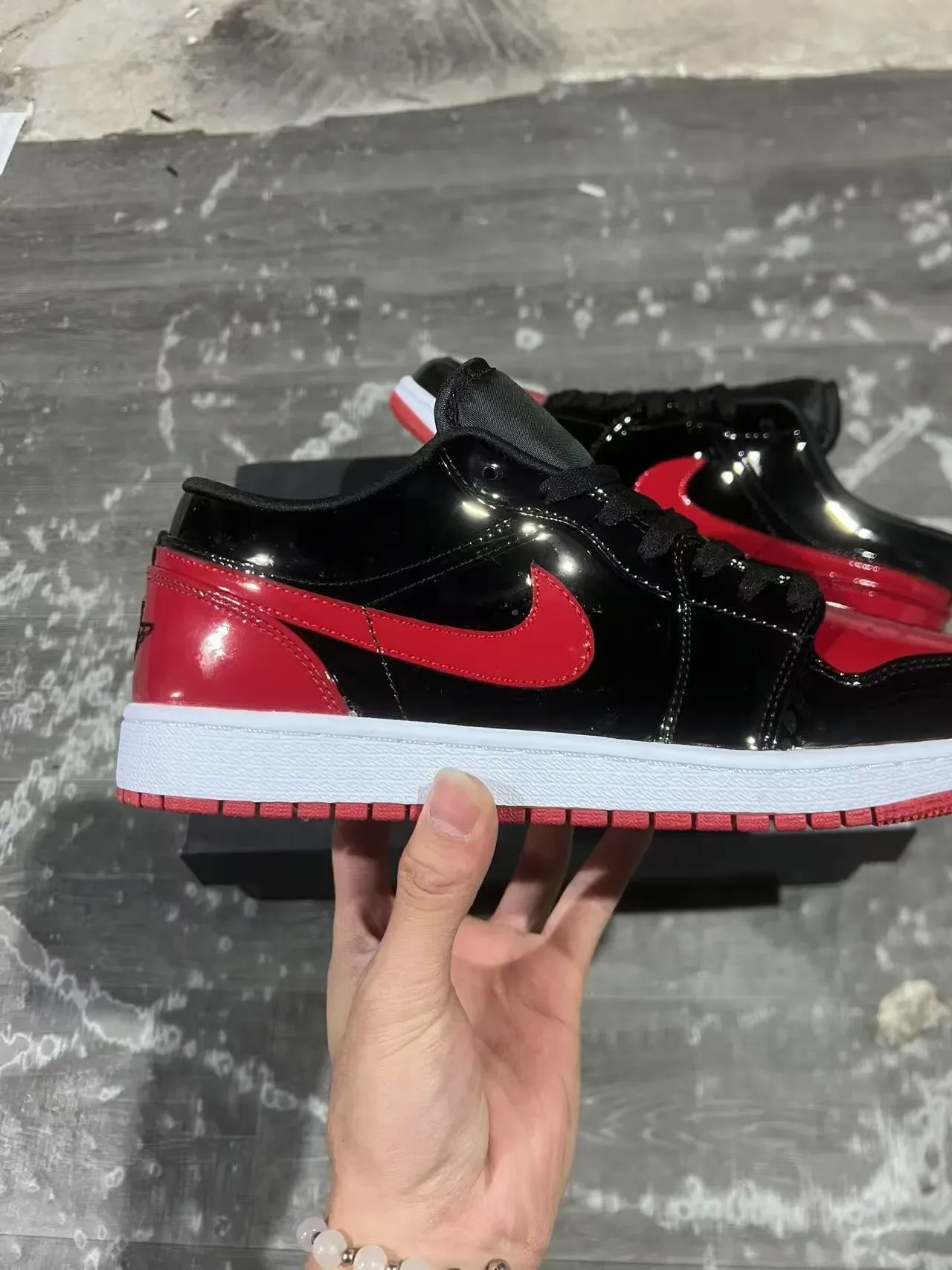 Nike Air Jordan 1 Low Preto Vermelho Brilhante tênis lifestyle 7