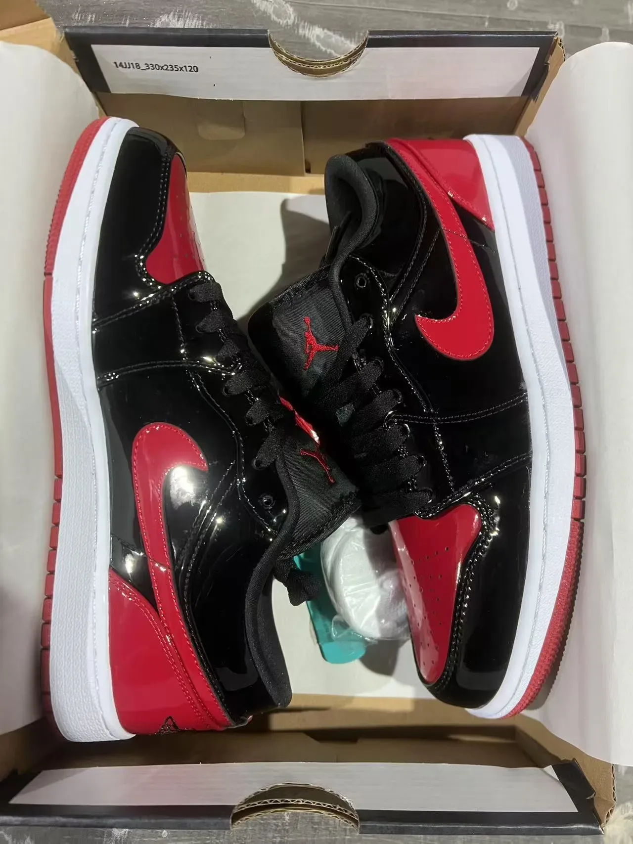 Nike Air Jordan 1 Low Preto Vermelho Brilhante tênis lifestyle 9