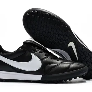 Nike Chuteiras de futebol turf preto e branco low-top com ponta quiltada